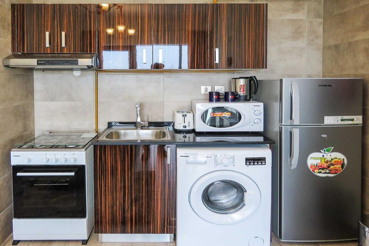 Oyo 860 Studio Apartment, Maya Tower 4, Jumeirah Village Triangle Dubai Esterno foto