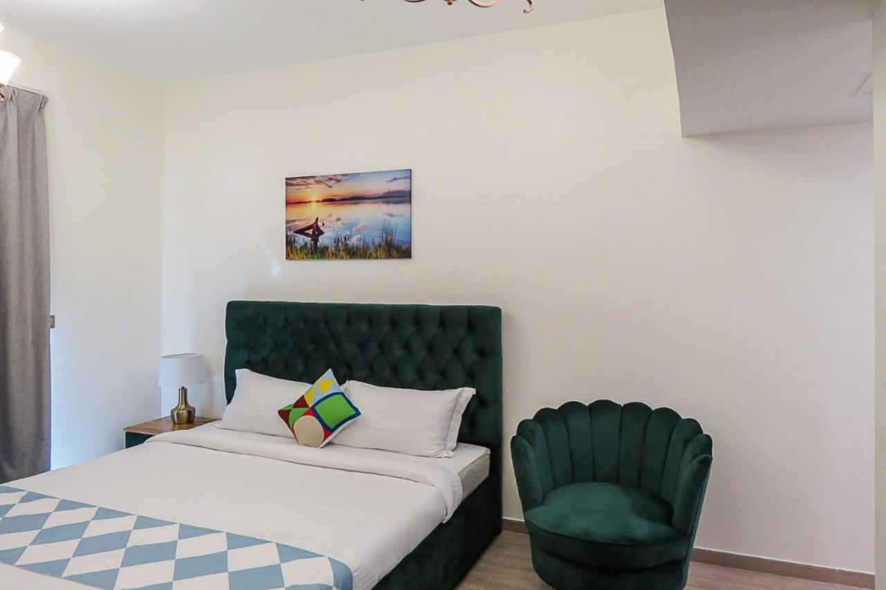 Oyo 860 Studio Apartment, Maya Tower 4, Jumeirah Village Triangle Dubai Esterno foto