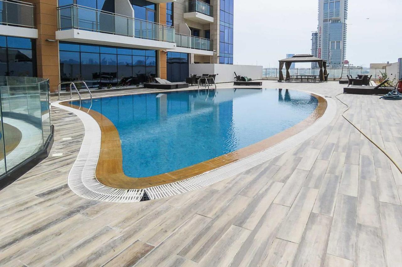 Oyo 860 Studio Apartment, Maya Tower 4, Jumeirah Village Triangle Dubai Esterno foto